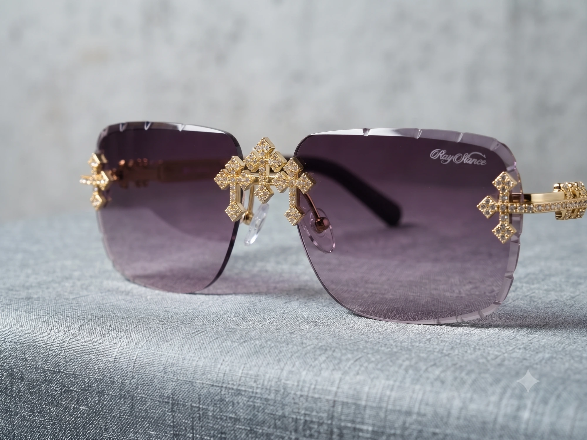 RayStance Reign — purple rimless sunglasses with jewelled gold crosses